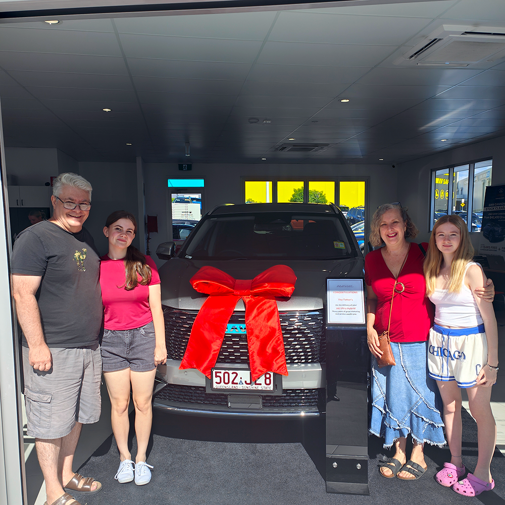 Tatters family with new car